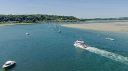 default Tour boat returning along the coastline and beaches of Courtmacsherry West Cork